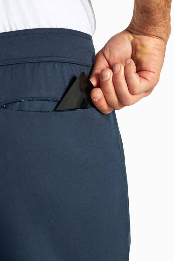 Balance Collection For Men Commuter Pant, back view, showing visible design features and texture of the durable stretch fabric..