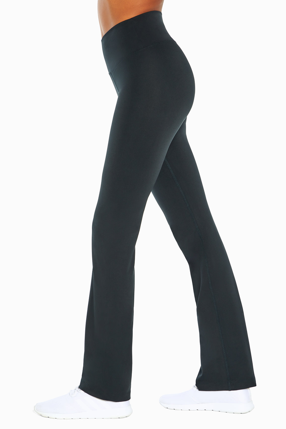 Balance Collection Barely Flare Pant, alternate angle view, showing visible design features and texture of the durable stretch fabric..