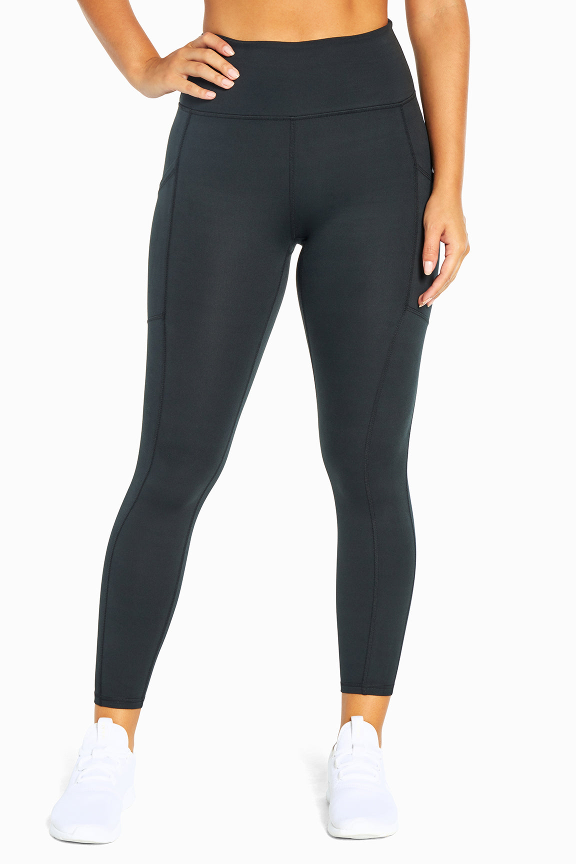 Balance Collection Easy Eclipse Side Pocket Ankle Legging - Black, alternate angle view, showing visible design features and texture of the stretch..