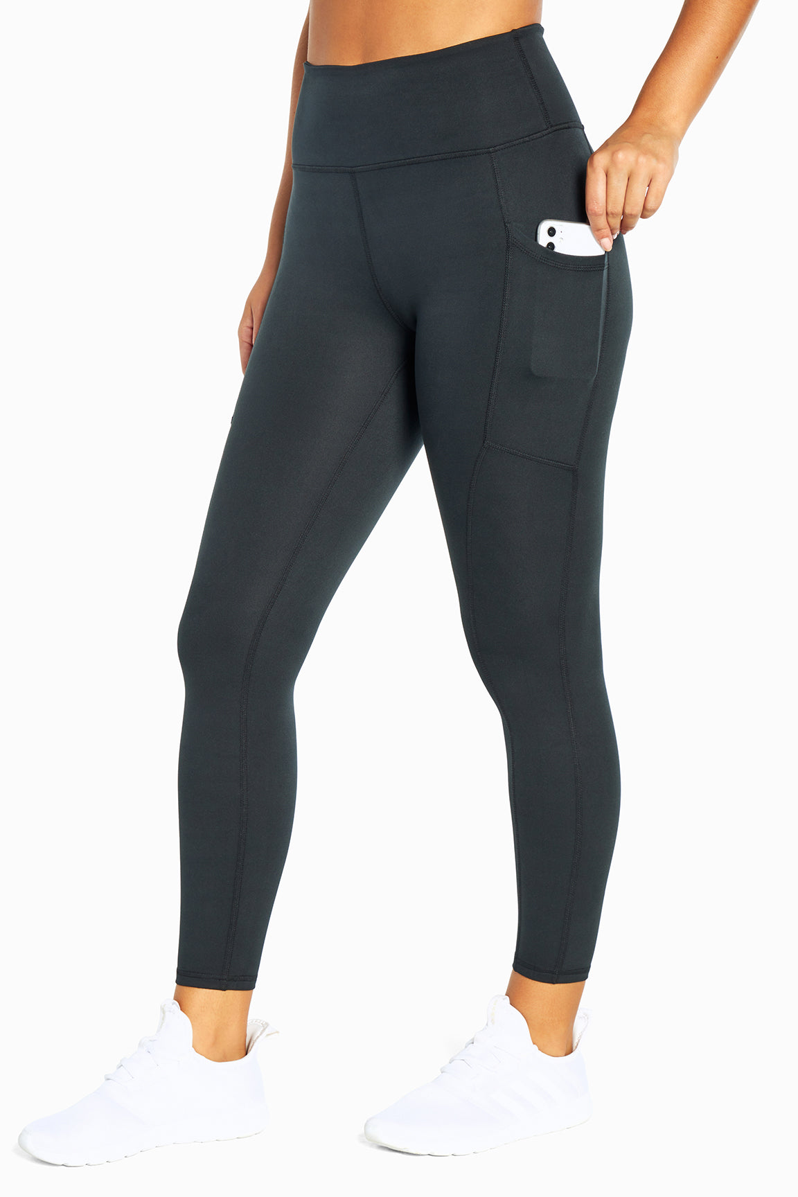 Balance Collection Easy Eclipse Side Pocket Ankle Legging - Black, front view, showing visible design features and texture of the stretch knit fabric..