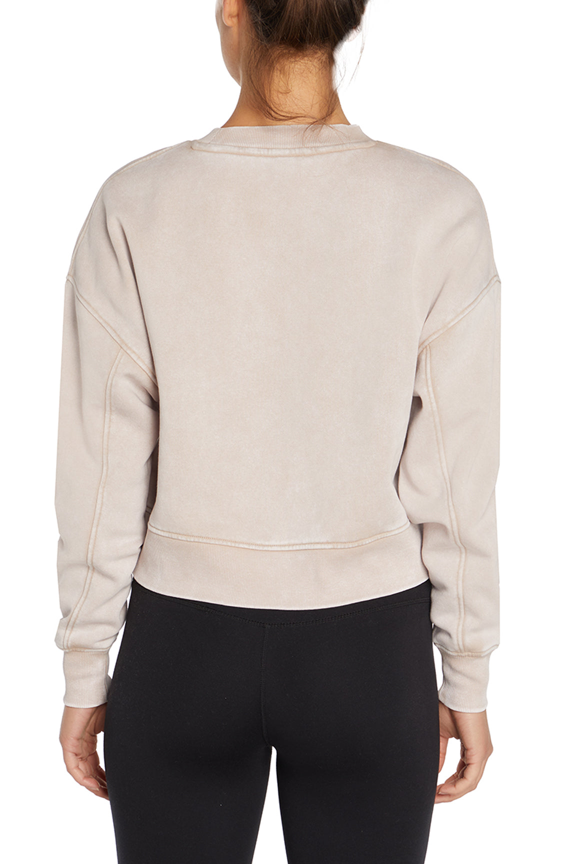 Balance Collection Max Sweatshirt, side view showing pocket placement, showing visible design features and texture of the soft knit fabric..