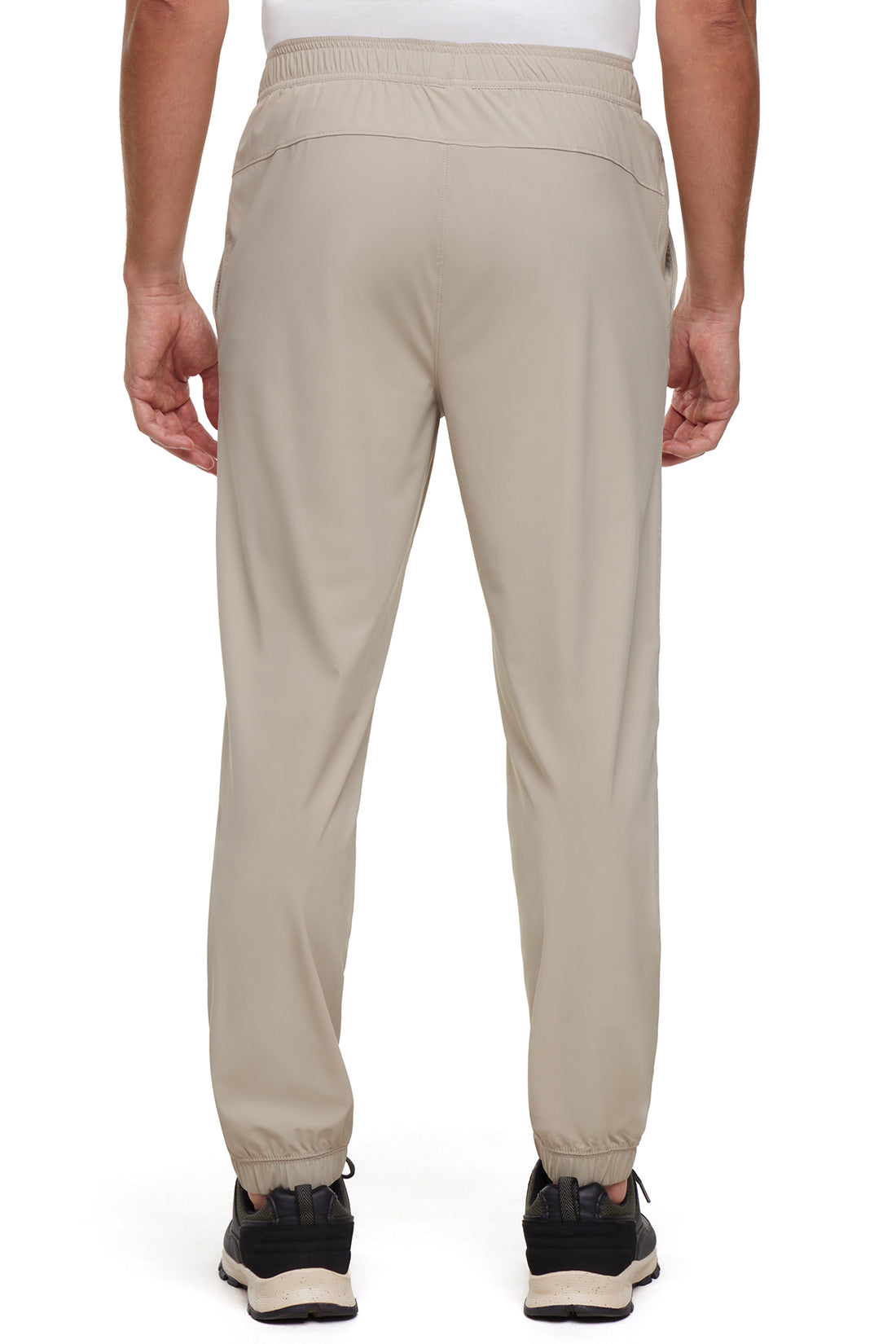 Balance Collection For Men Calvin Jogger, side view showing pocket placement, showing visible design features and texture of the soft knit fabric..