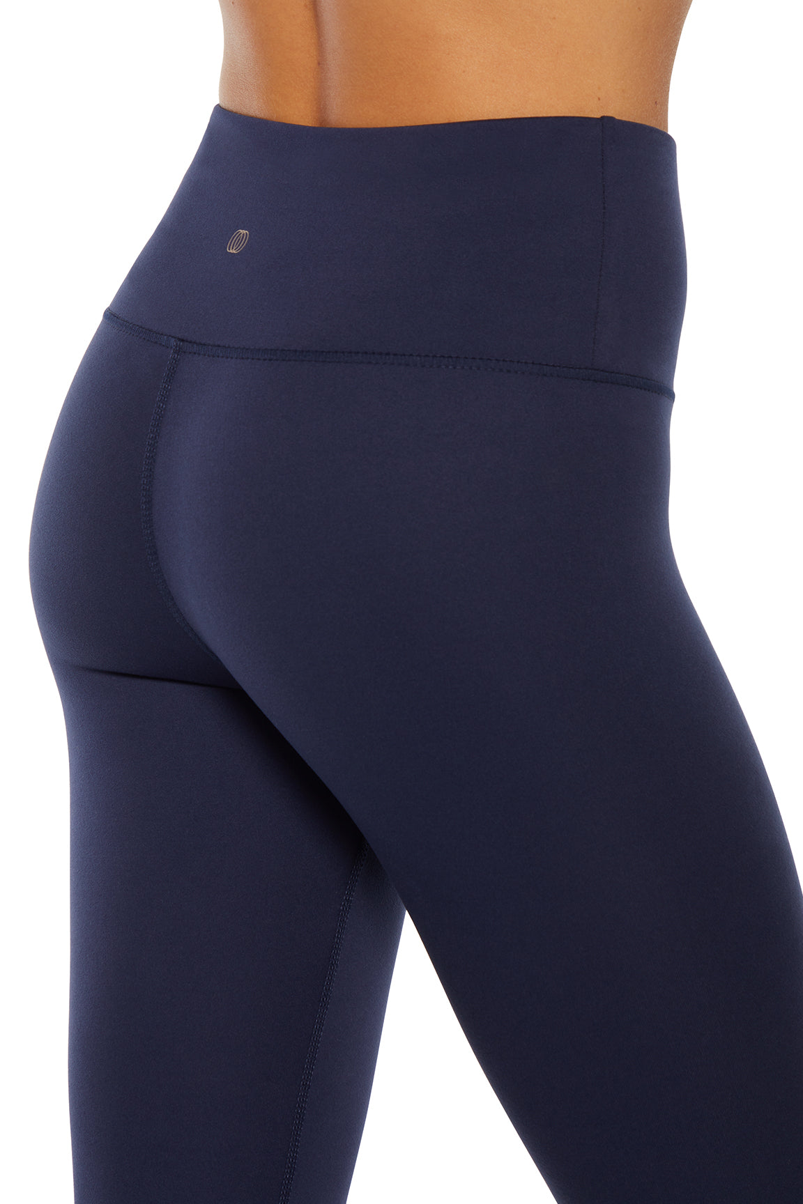 Balance Collection Basic High-Rise Tummy Control Legging, back view, showing visible design features and texture of the stretch knit fabric..