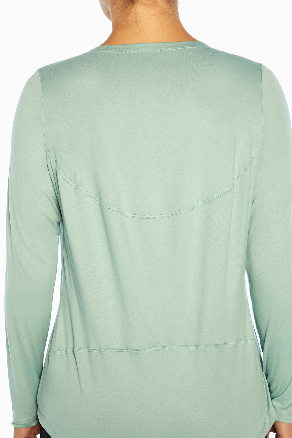 Tabby Long Sleeve Top, side view showing pocket placement, showing visible design features and texture of the soft knit fabric..