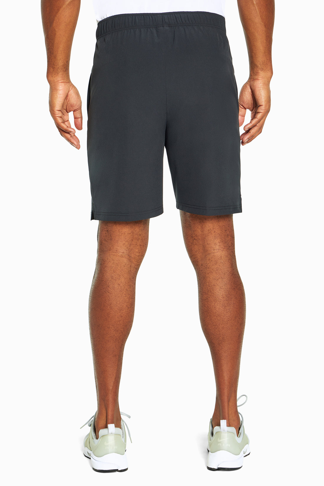 Balance Collection For Men Base Short, side view showing pocket placement, showing visible design features and texture of the soft knit fabric..