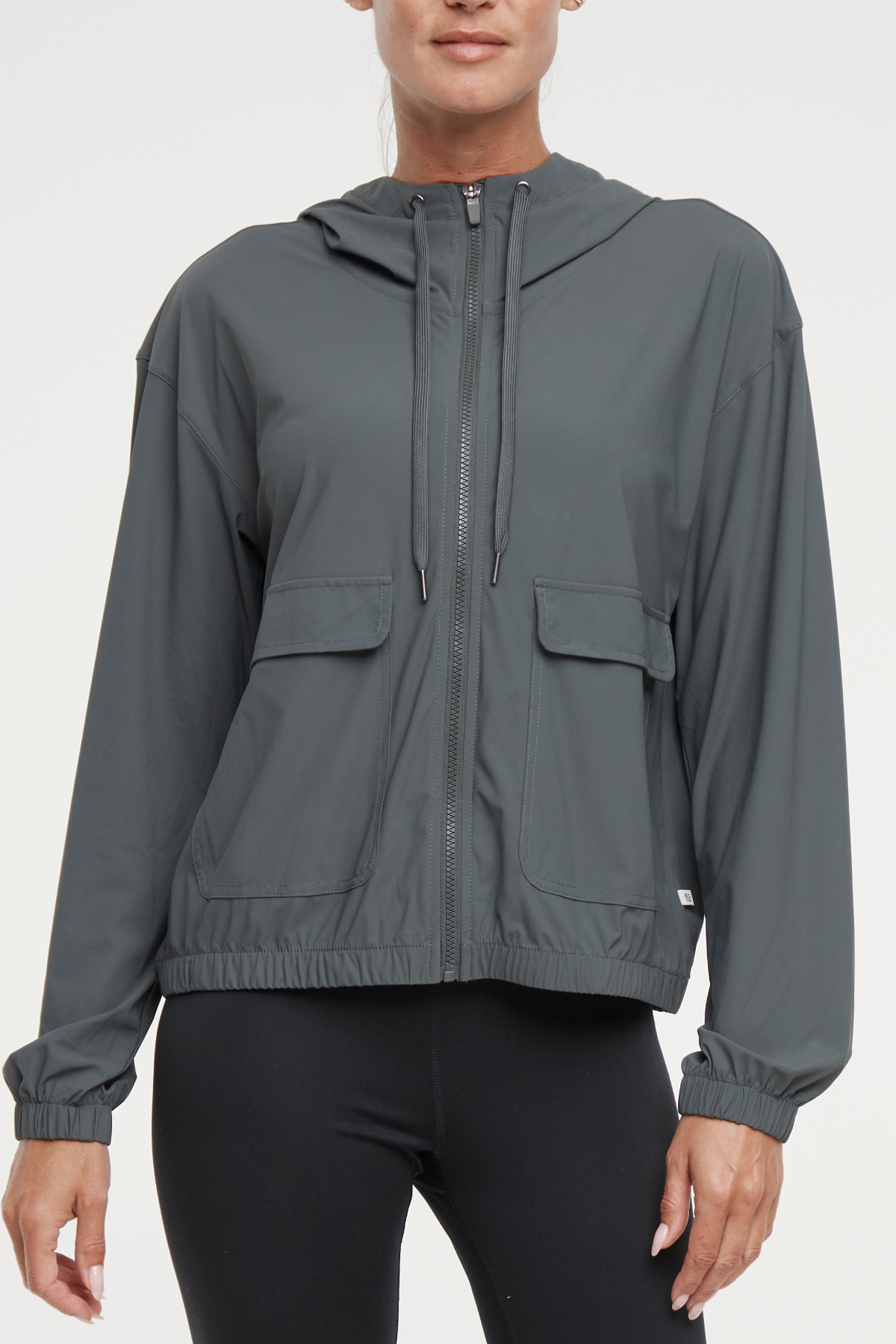 Nori Jacket, front view, showing visible design features and texture of the smooth woven fabric..