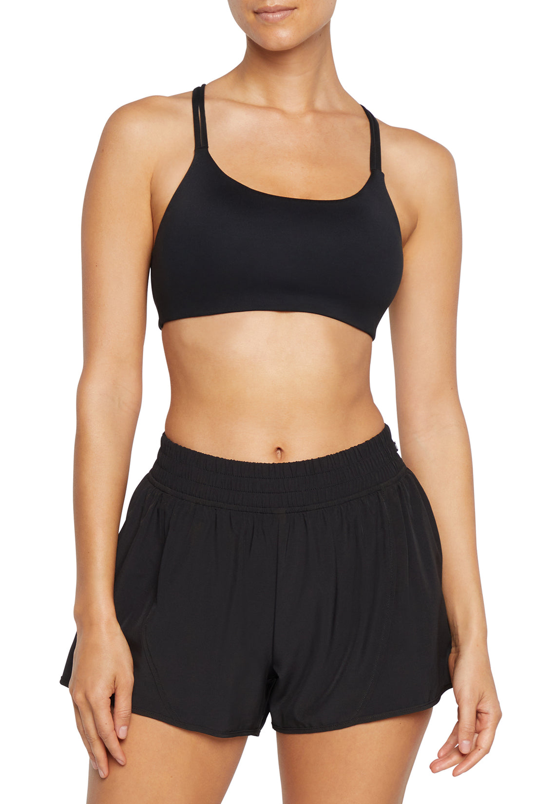 Camilla Sports Bra - Black, front view, showing visible design features and texture of the soft knit fabric..