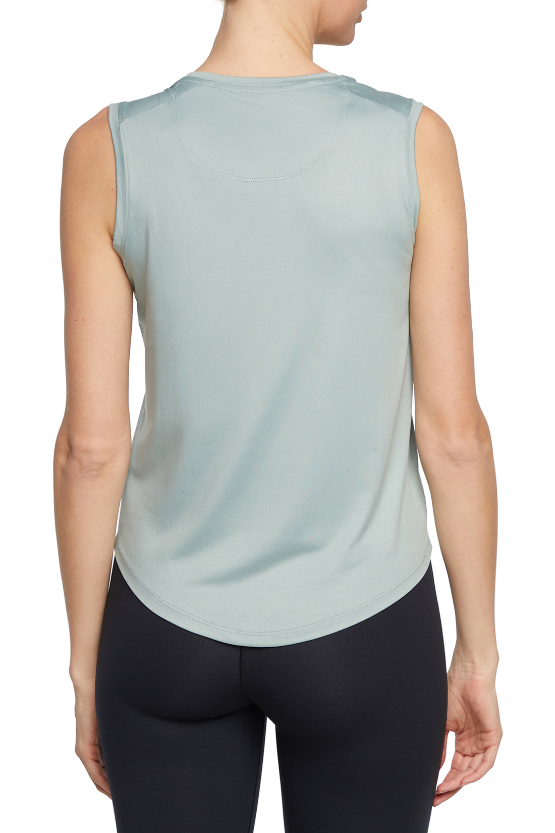 Mili Tank, side view showing pocket placement, showing visible design features and texture of the soft knit fabric..