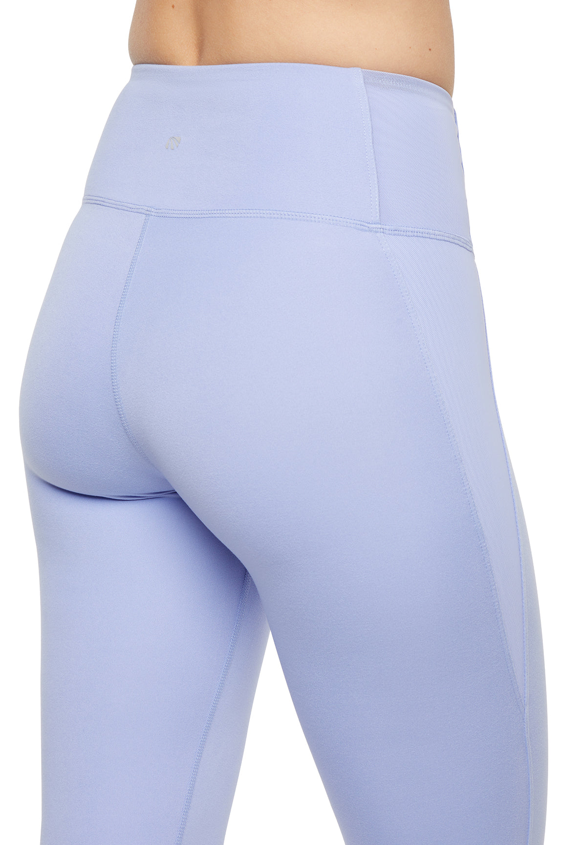 Annie Mesh Tight Ankle Legging, side view showing pocket placement, showing visible design features and texture of the stretch knit fabric..