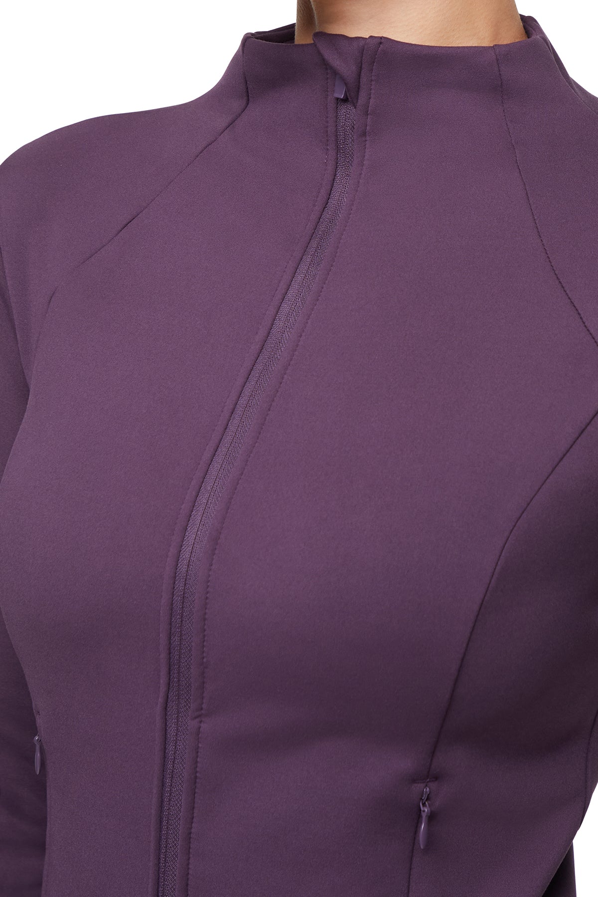 Audrie Jacket, close-up view of fabric and stitching, showing visible design features and texture of the smooth woven fabric..