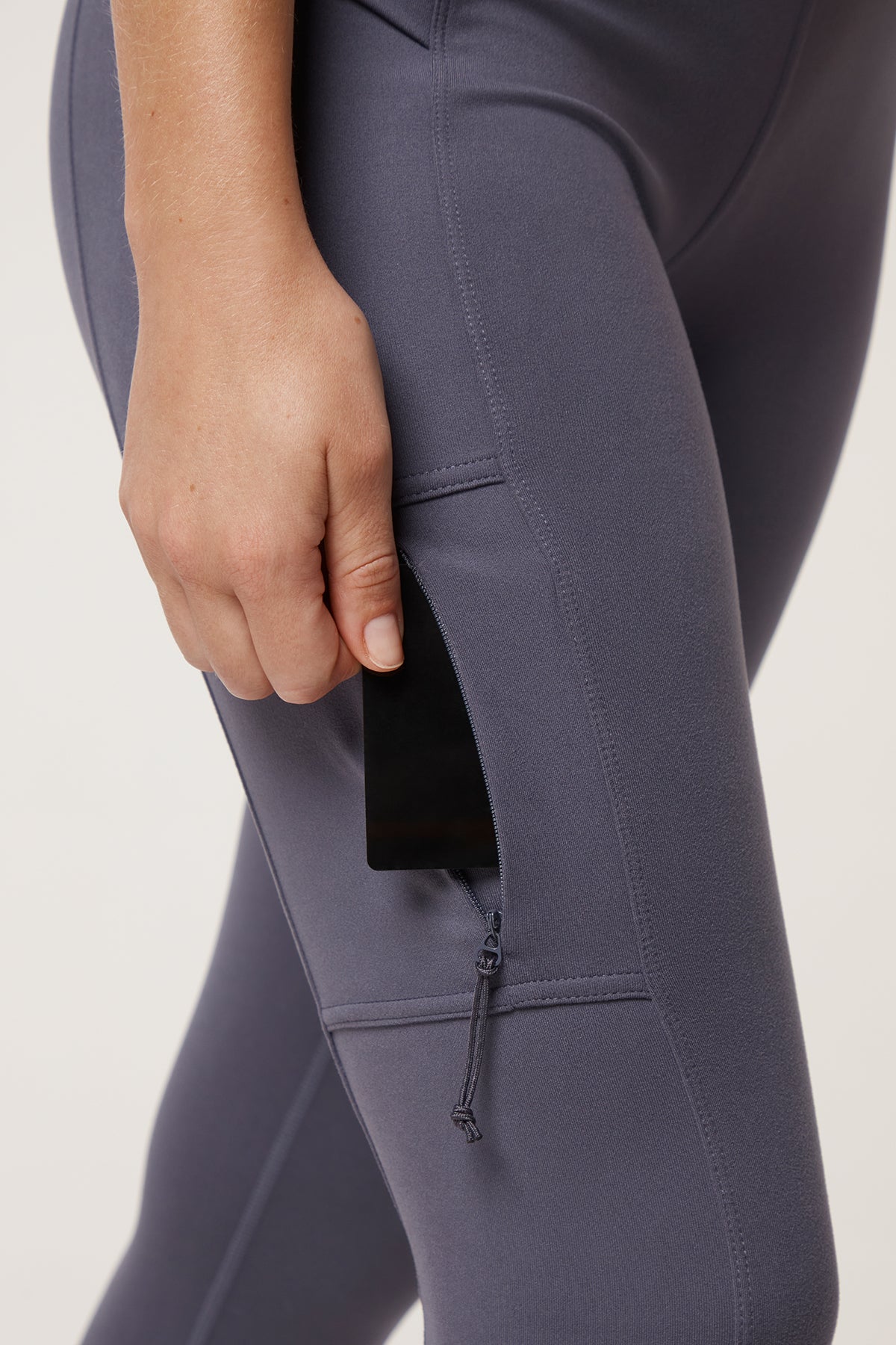 Faye Side Pocket Legging, back view, showing visible design features and texture of the stretch knit fabric..