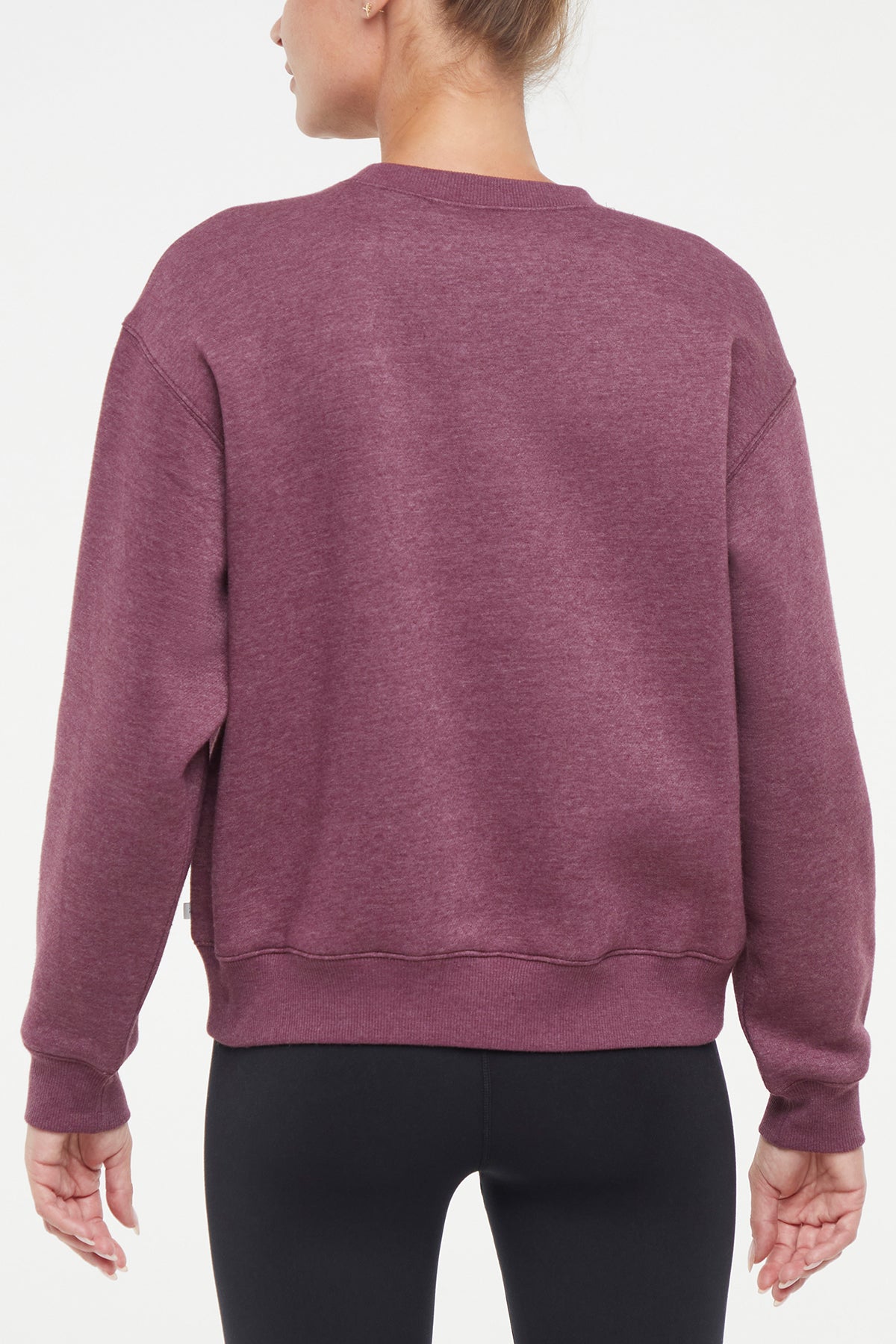 Meira Fleece Sweatshirt, alternate angle view, showing visible design features and texture of the soft knit fabric..