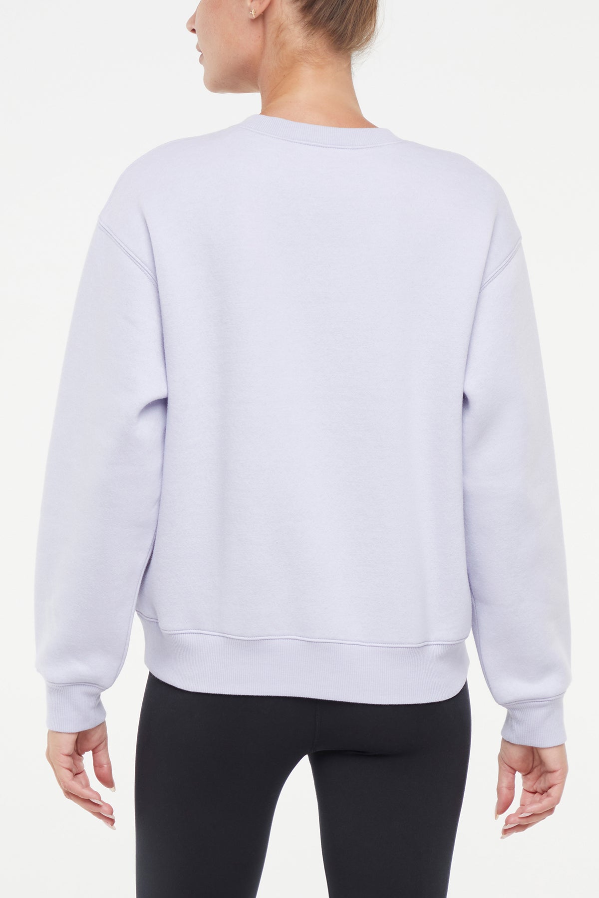 Meira Fleece Sweatshirt, alternate angle view, showing visible design features and texture of the soft knit fabric..