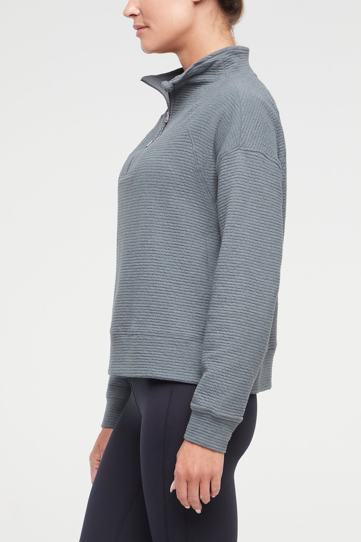 Freyi Pullover, close-up view of fabric and stitching, showing visible design features and texture of the soft knit fabric..