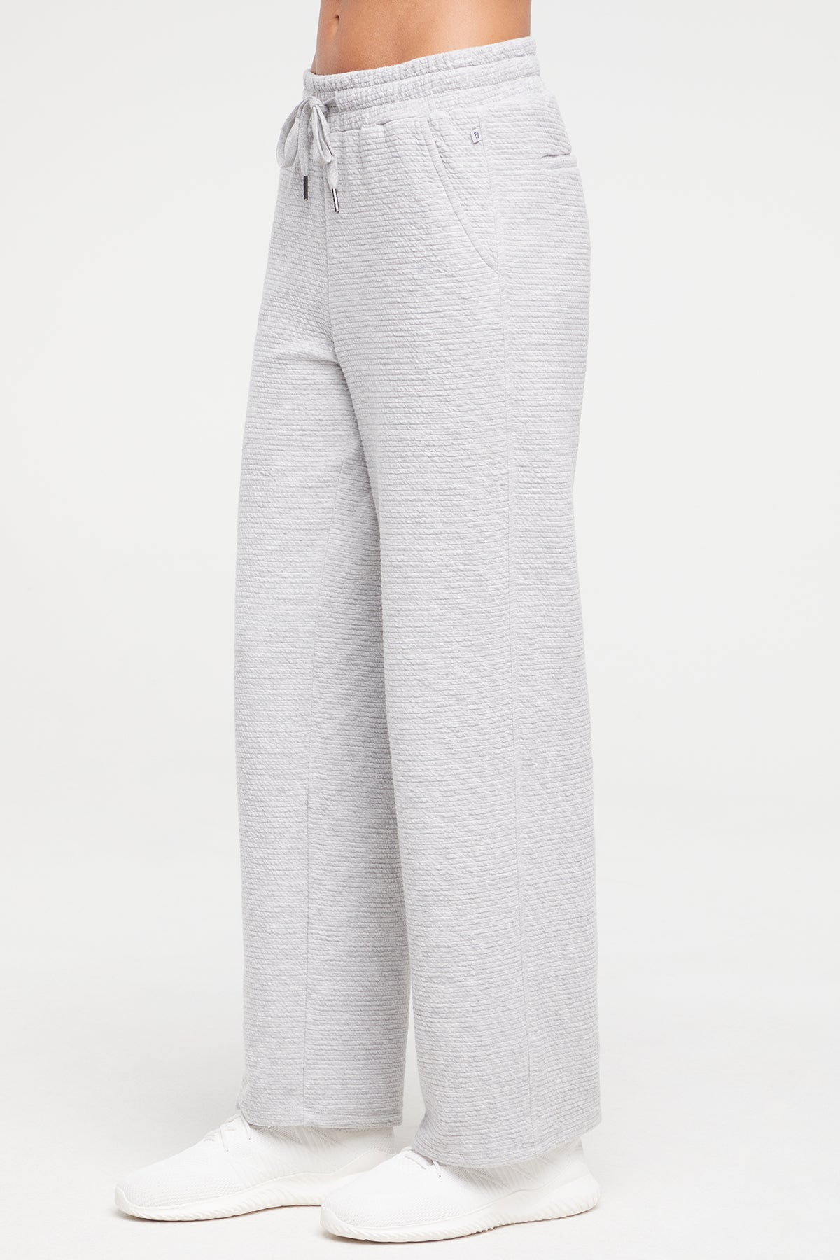 Freyi Pant, alternate angle view, showing visible design features and texture of the durable stretch fabric..