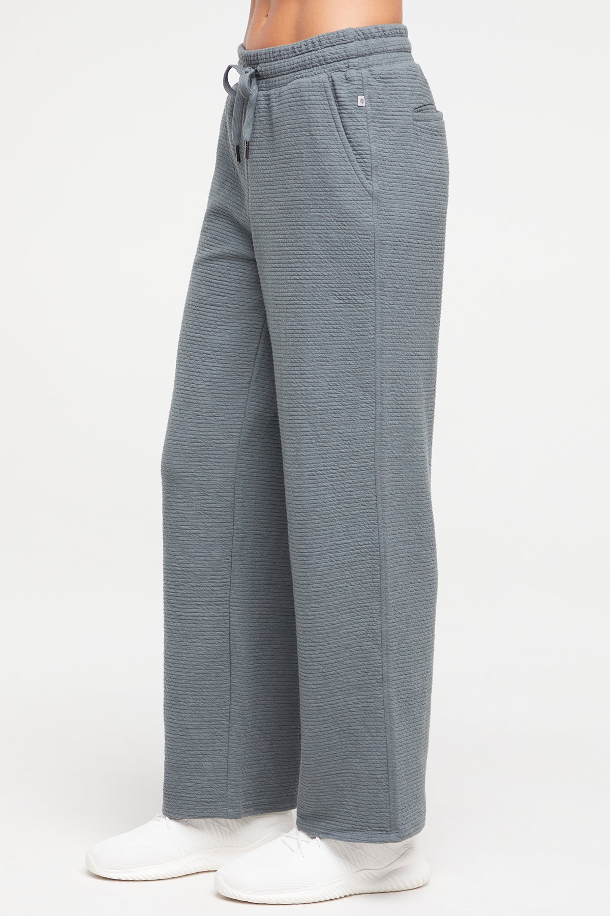 Freyi Pant, alternate angle view, showing visible design features and texture of the durable stretch fabric..