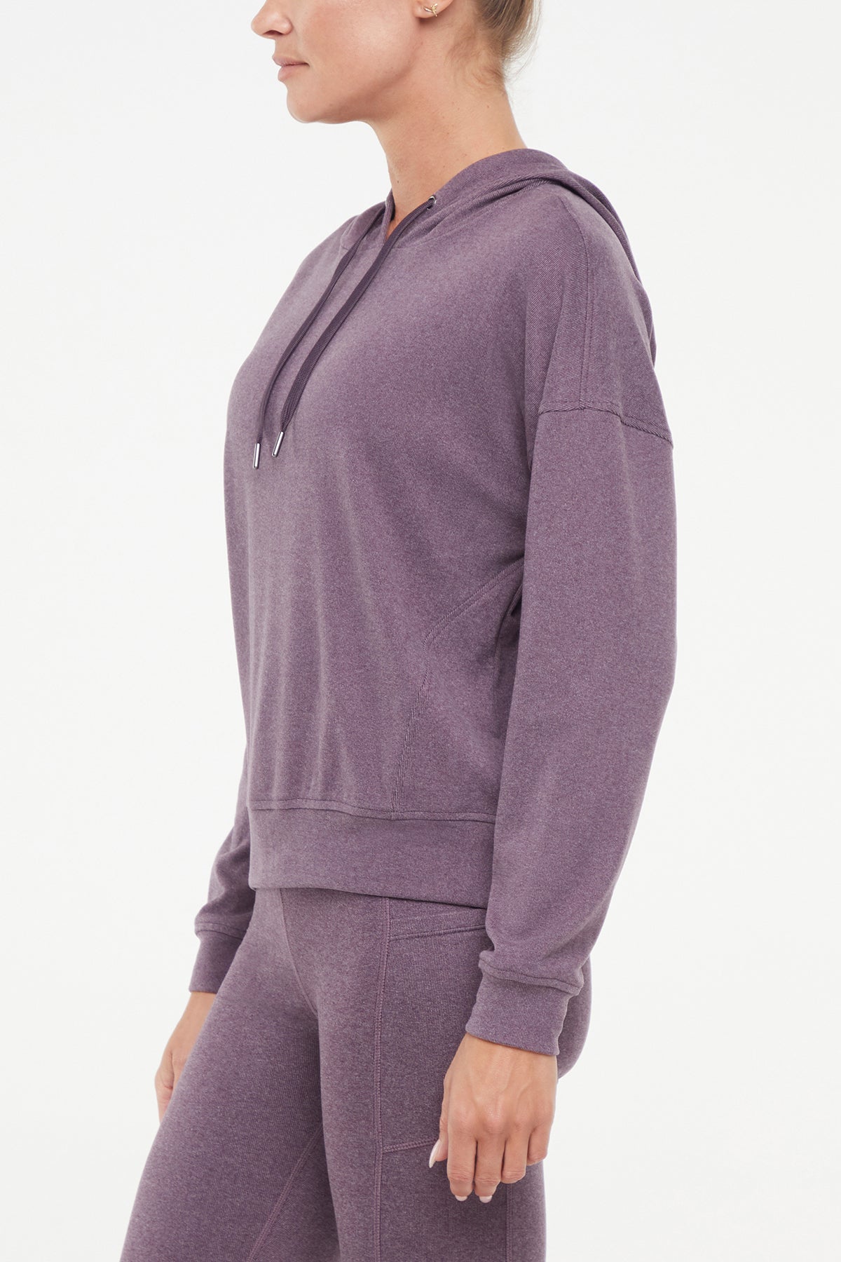Riley Hoodie, alternate angle view, showing visible design features and texture of the soft fleece fabric..
