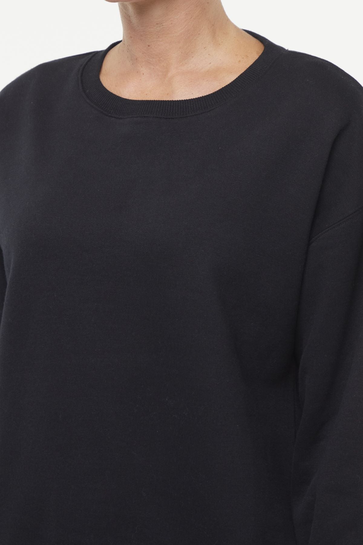 Camila Pullover, back view, showing visible design features and texture of the soft knit fabric..