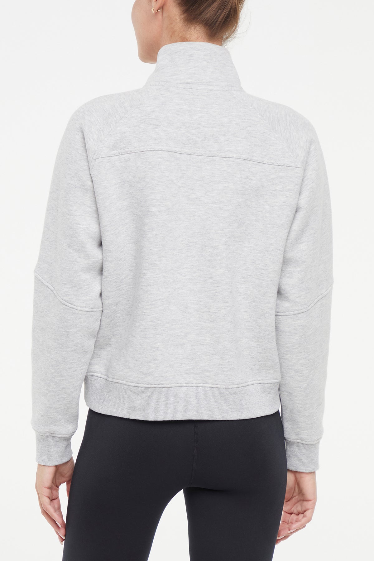 Camila 1/4 Zip Jacket, alternate angle view, showing visible design features and texture of the smooth woven fabric..