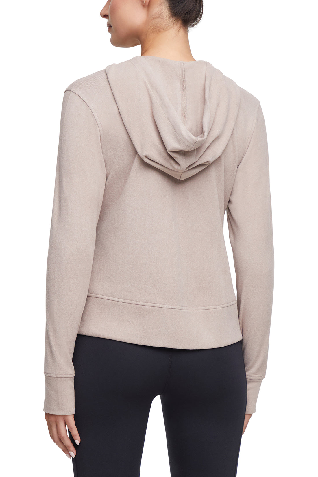 Riley Full Zip Hoodie, side view showing pocket placement, showing visible design features and texture of the soft fleece fabric..