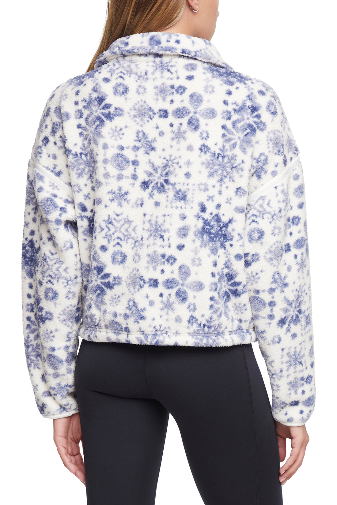 Blair Sherpa Jacket, side view showing pocket placement, showing visible design features and texture of the smooth woven fabric..