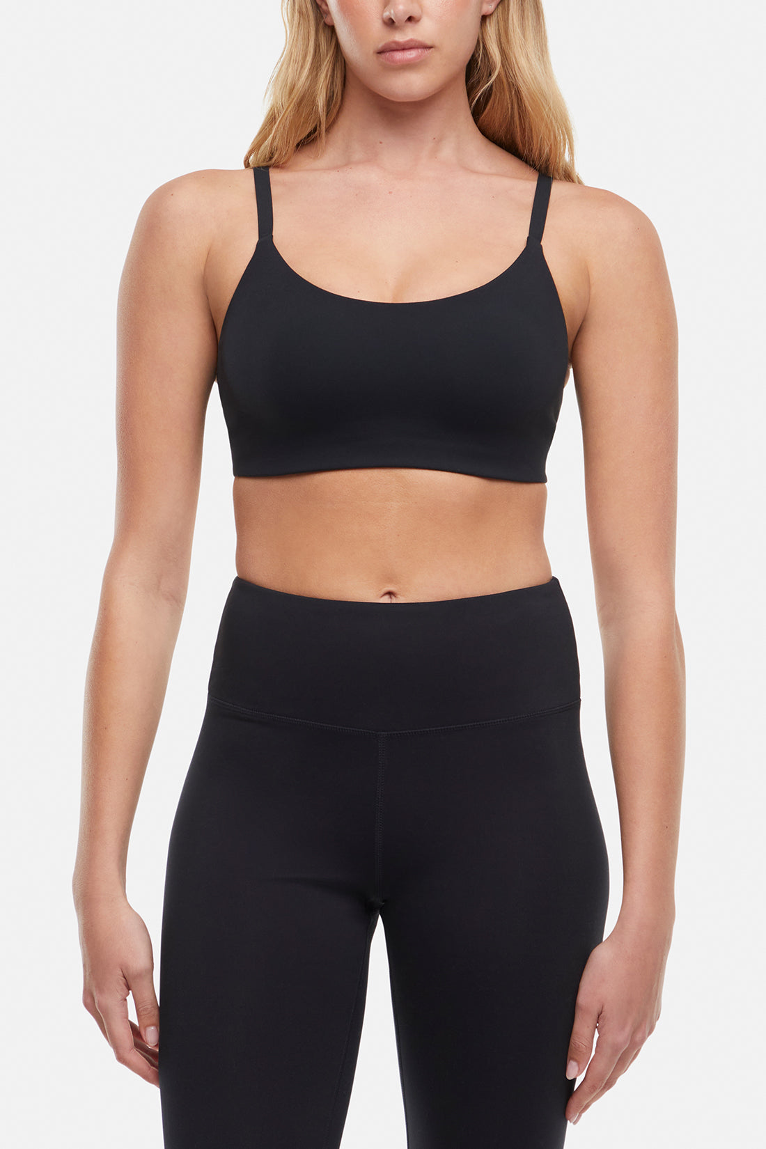 Alba Sports Bra, close-up view of fabric and stitching, showing visible design features and texture of the soft knit fabric.