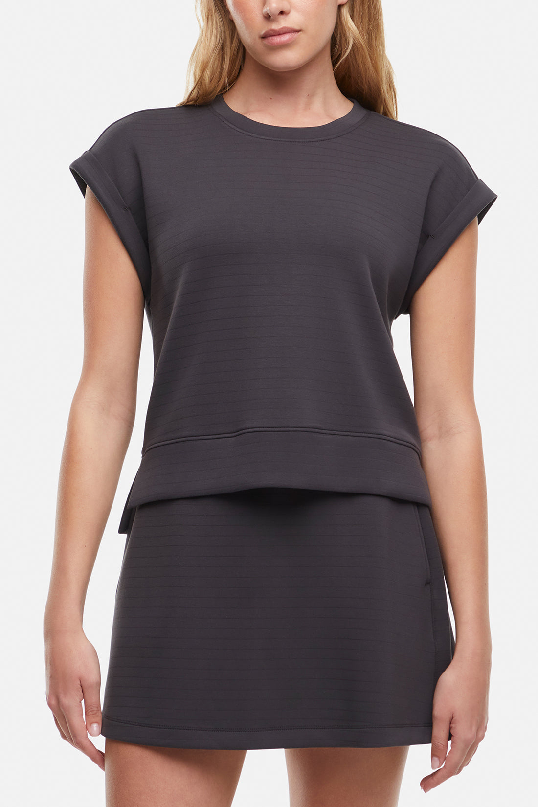 Becky Short Sleeve Crew Neck Top, close-up view of fabric and stitching, showing visible design features and texture of the soft knit fabric.