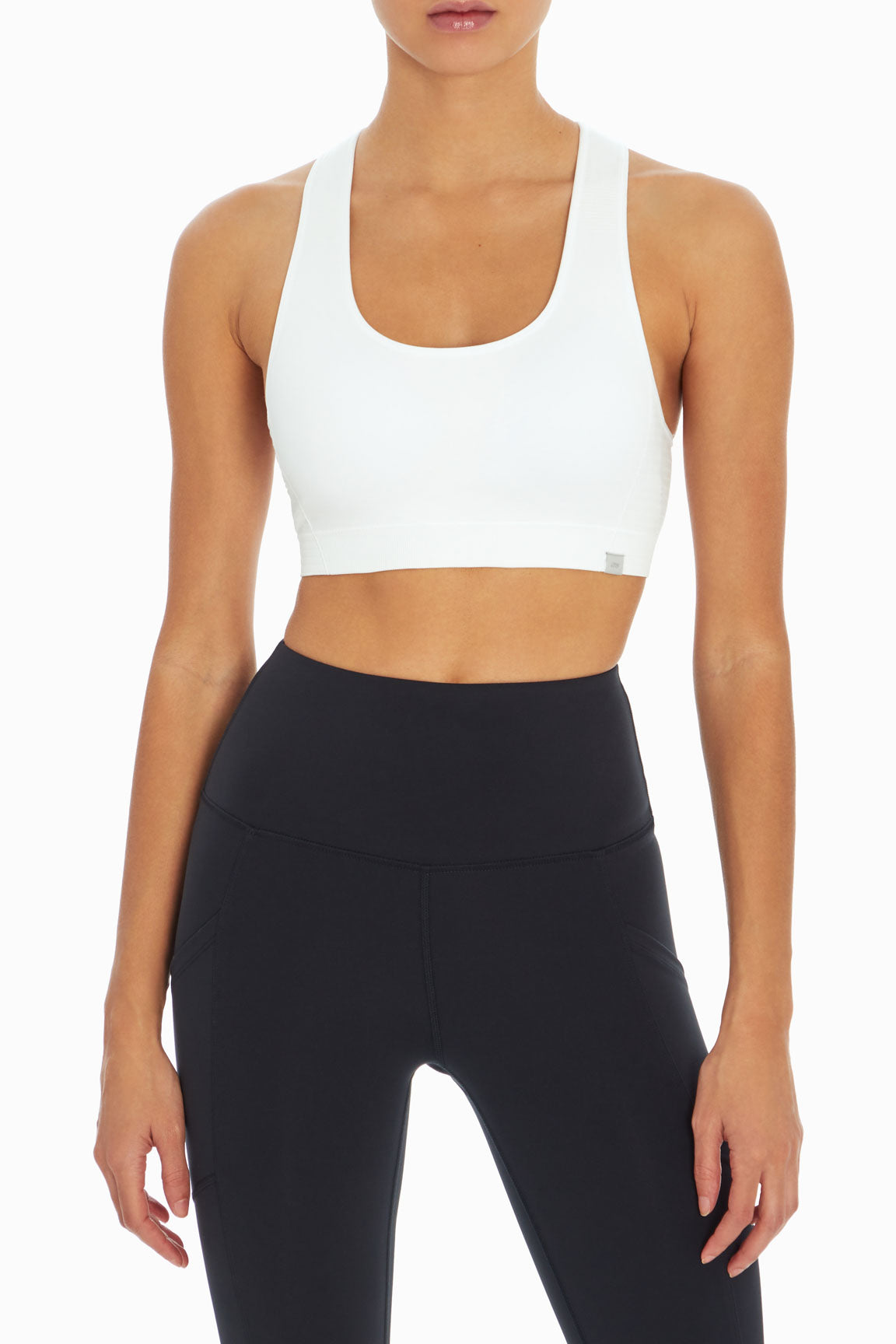 Haley Seamless Sports Bra, alternate angle view, showing visible design features and texture of the soft knit fabric..