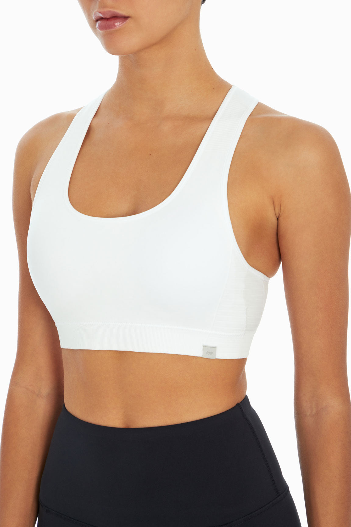Haley Seamless Sports Bra, alternate angle view, showing visible design features and texture of the soft knit fabric..