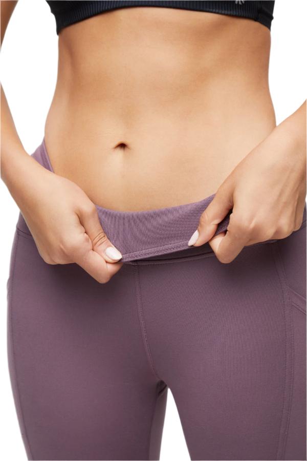 Drew Side Pocket Tummy Control Mid Calf Capri - Black Plum, side view showing pocket placement, showing visible design features and texture of the..