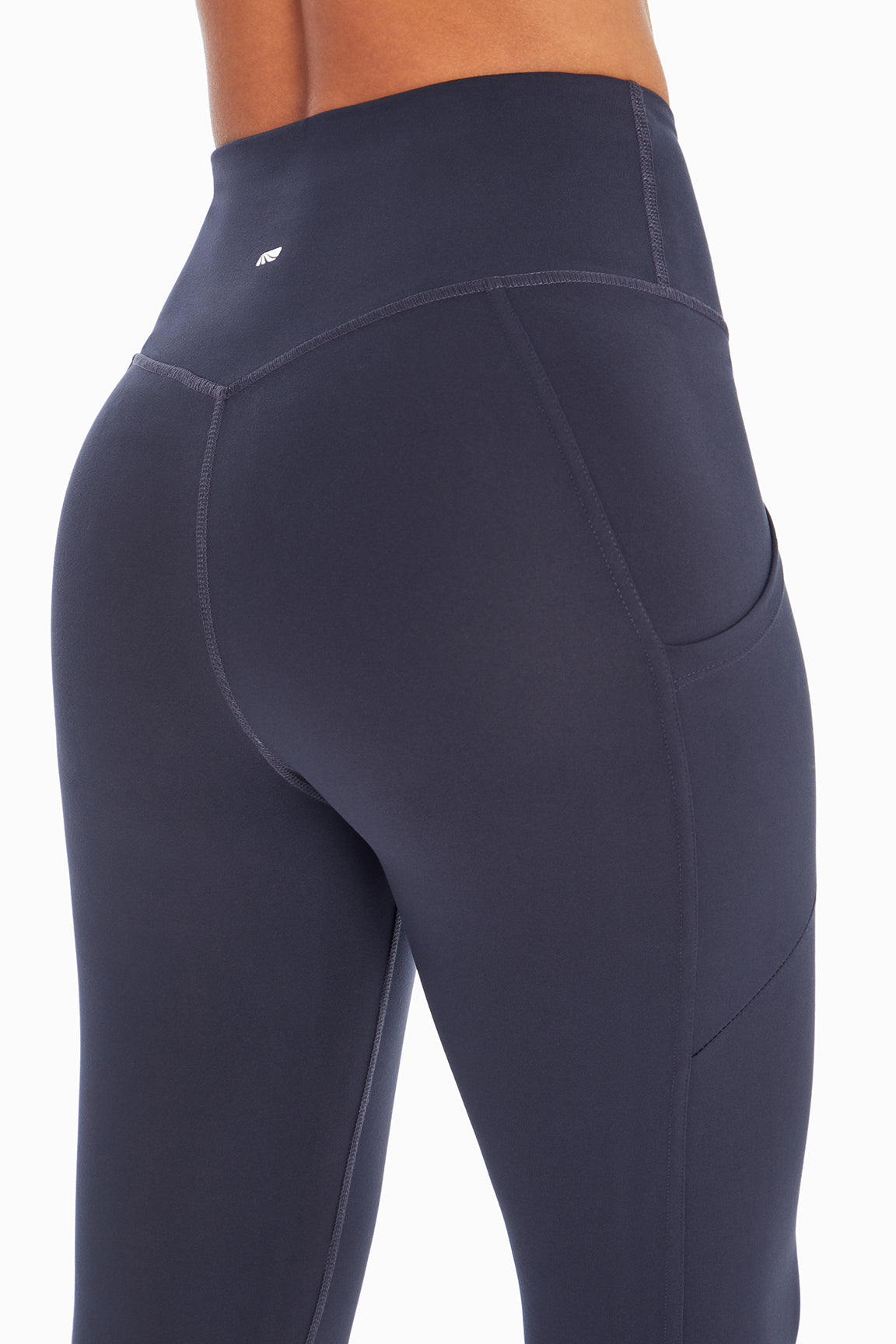 Drew Side Pocket Tummy Control Mid Calf Capri, alternate angle view, showing visible design features and texture of the soft knit fabric..