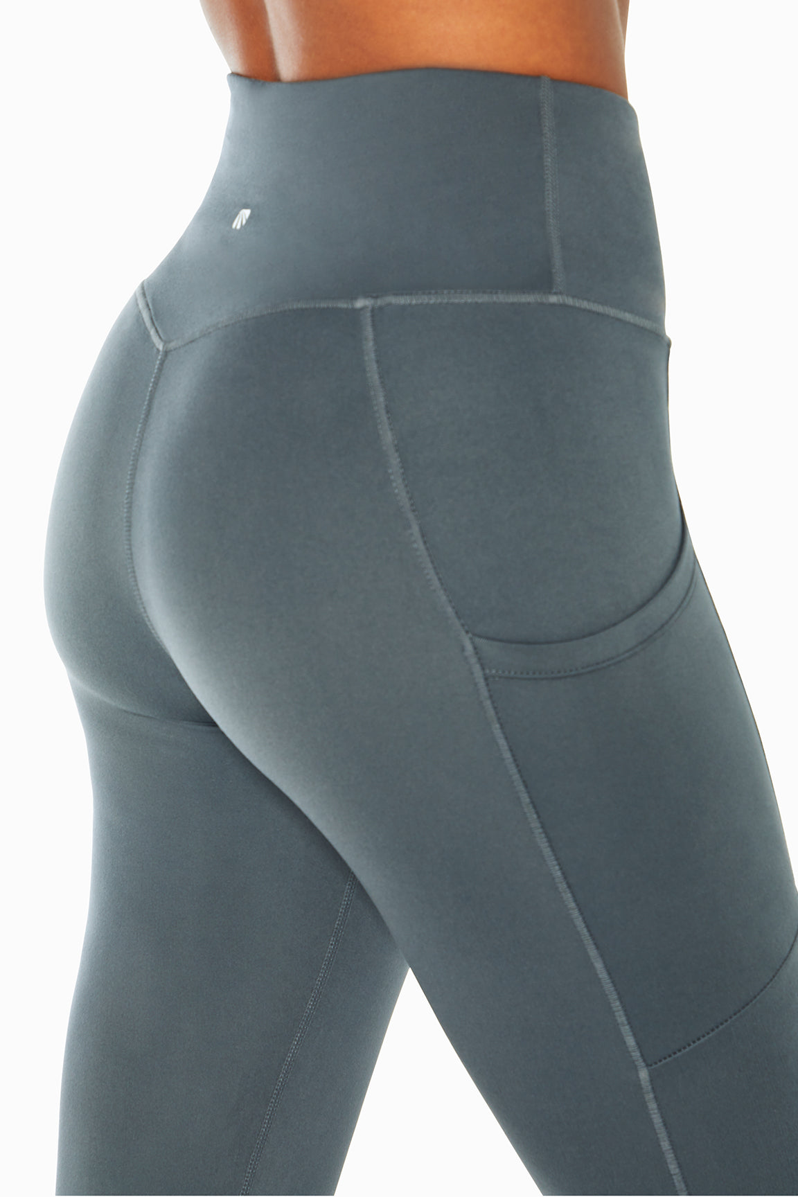 Talia Side Pocket Tummy Control Legging, alternate angle view, showing visible design features and texture of the stretch knit fabric..