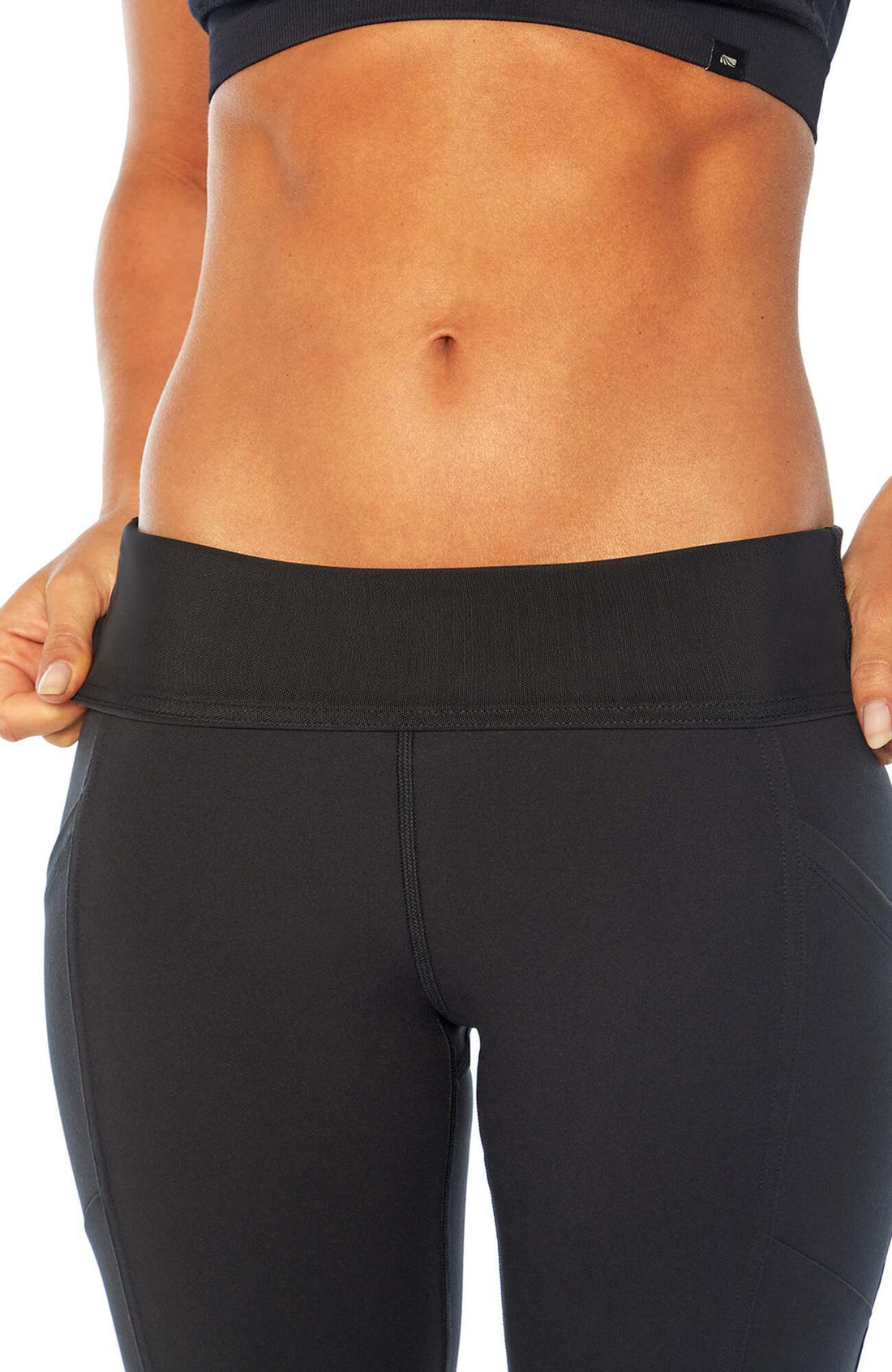 Olivia Side Pocket Tummy Control Bermuda Shorts, back view, showing visible design features and texture of the soft knit fabric..