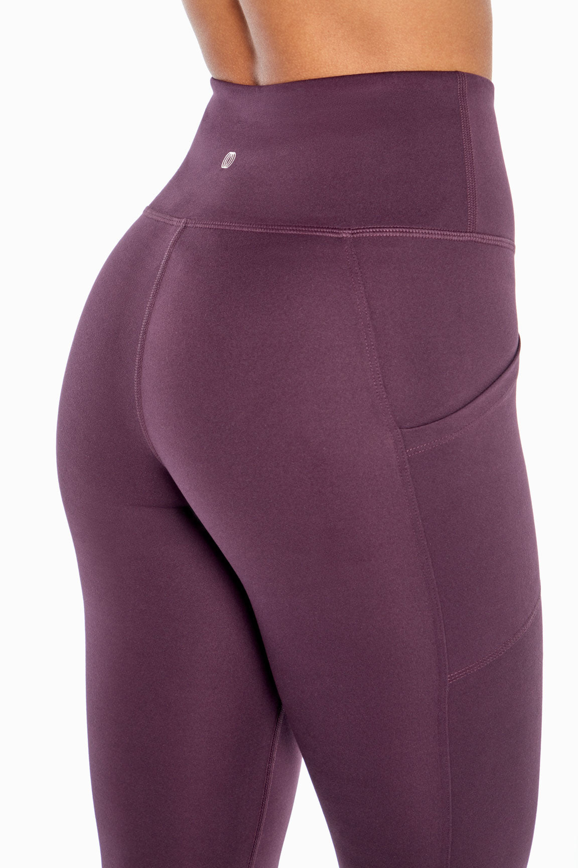 Balance Collection Eclipse Side Pocket Ankle Legging, alternate angle view, showing visible design features and texture of the stretch knit fabric..