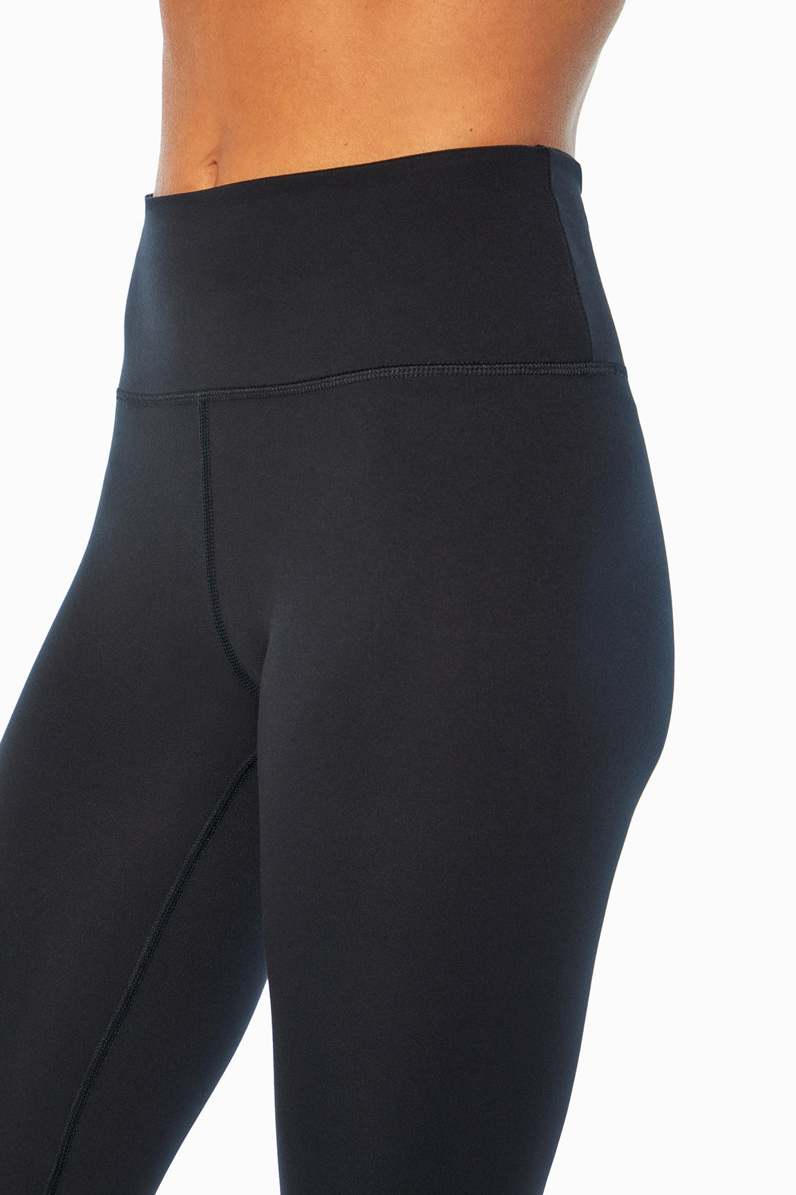 Balance Collection Easy Legging, close-up view of fabric and stitching, showing visible design features and texture of the stretch knit fabric..