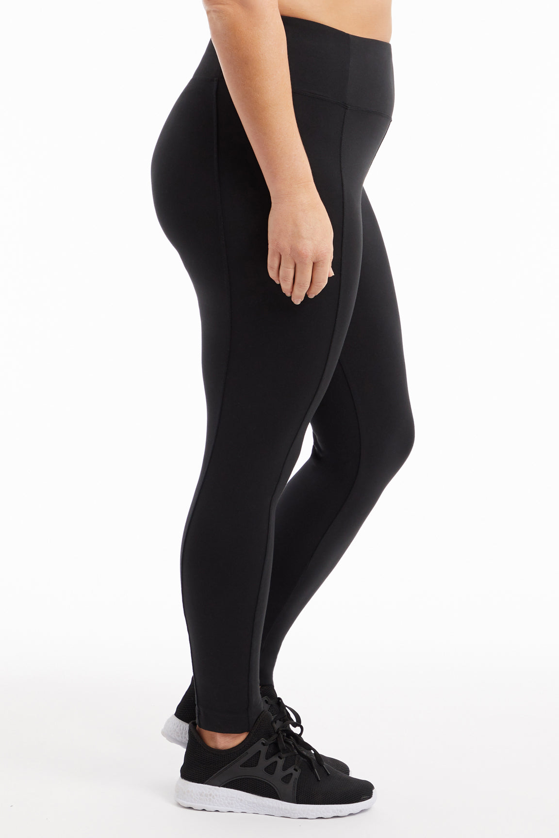 High-Rise Tummy Control Leggings (Plus Size), back view, showing visible design features and texture of the stretch knit fabric..