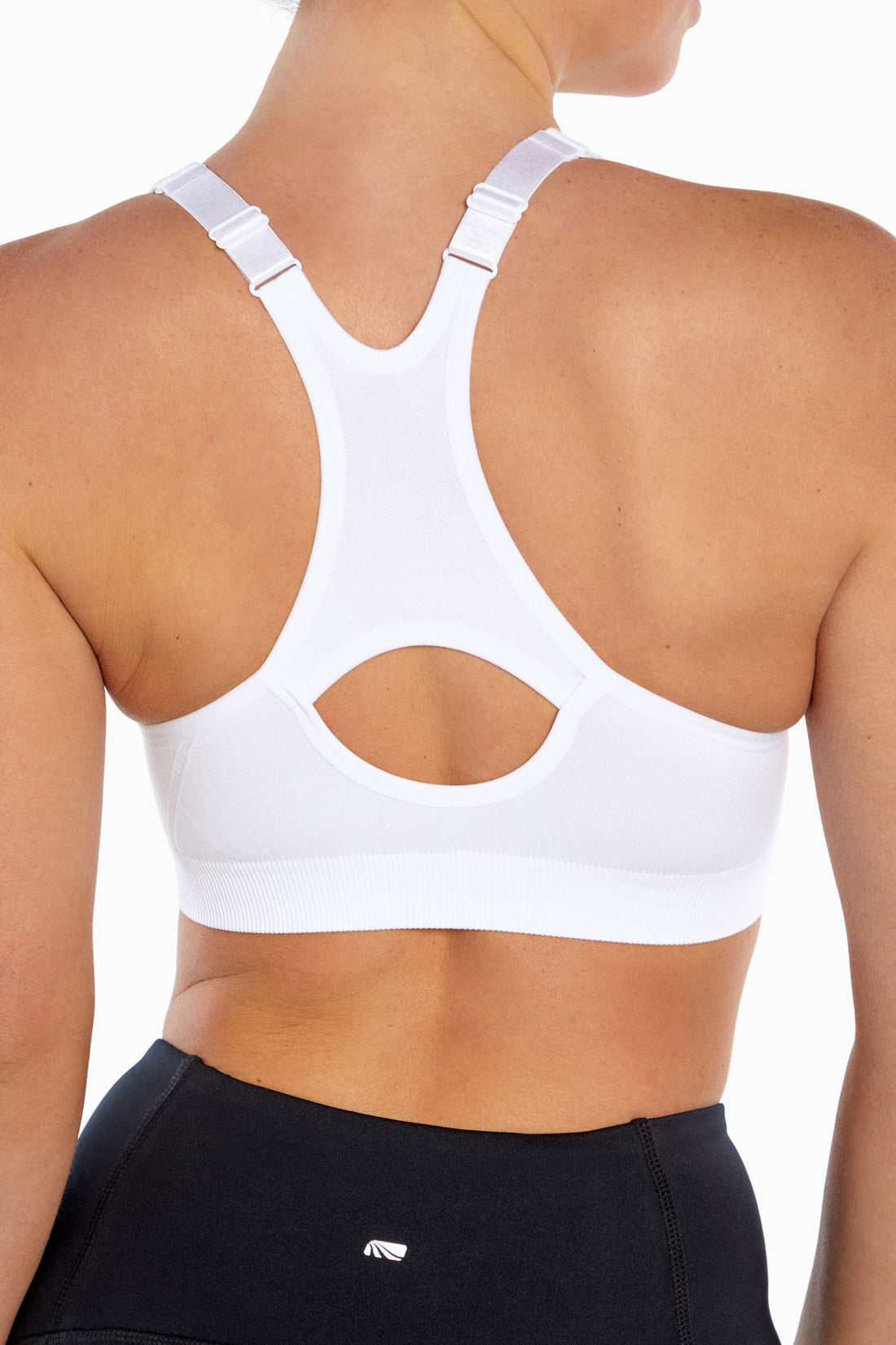 Savannah Seamless Front Zip Sports Bra, side view showing pocket placement, showing visible design features and texture of the soft knit fabric..