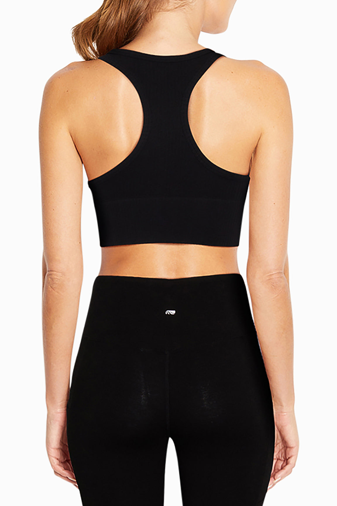 Evie Seamless Sports Bra, alternate angle view, showing visible design features and texture of the soft knit fabric..