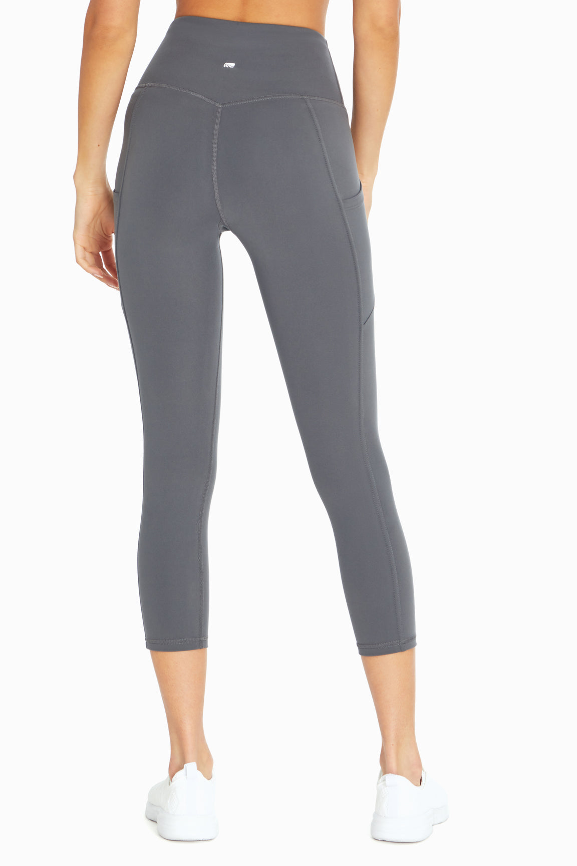 Drew Side Pocket Tummy Control Mid Calf Capri, alternate angle view, showing visible design features and texture of the soft knit fabric..