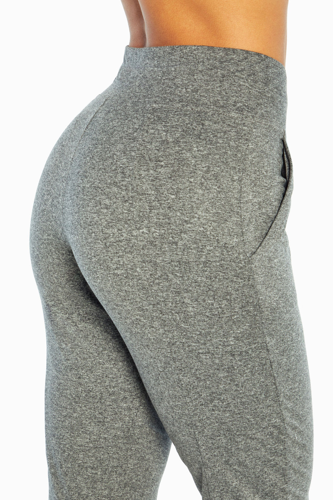Mona Capri, side view showing pocket placement, showing visible design features and texture of the soft knit fabric..
