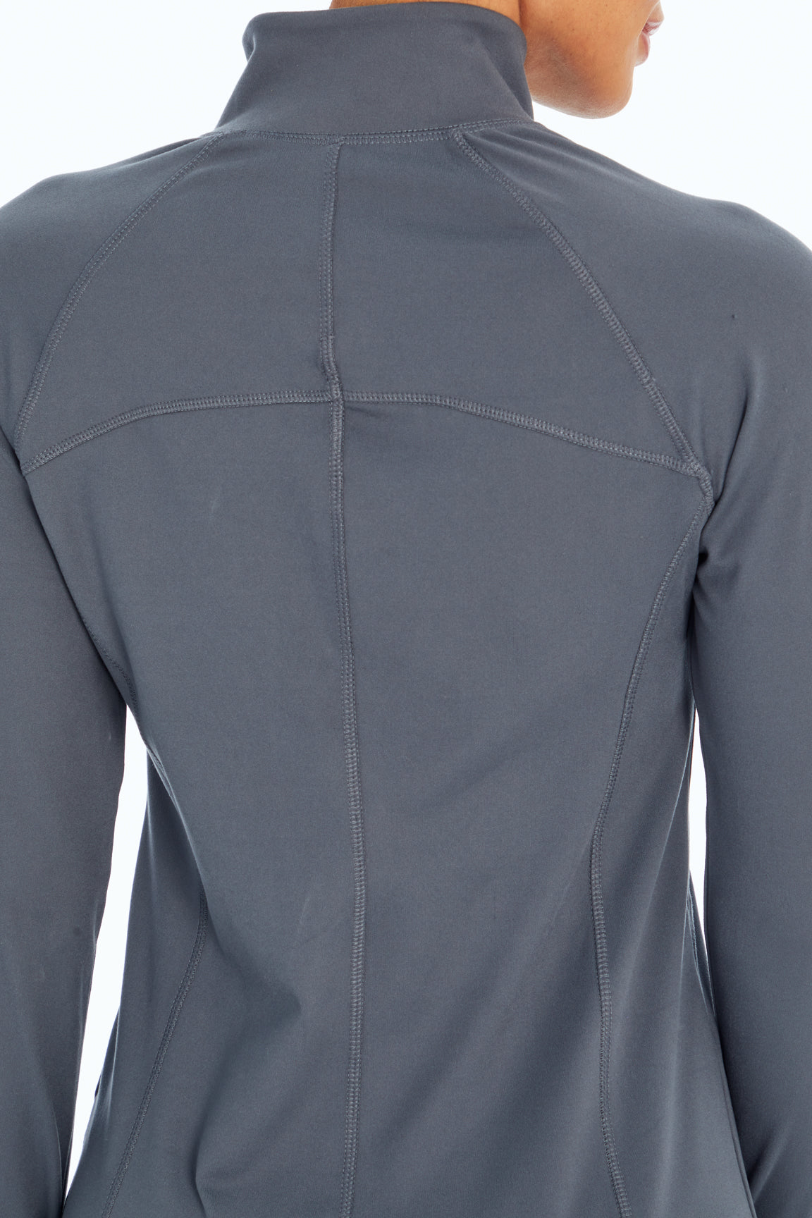 Revival Jacket, alternate angle view, showing visible design features and texture of the smooth woven fabric..