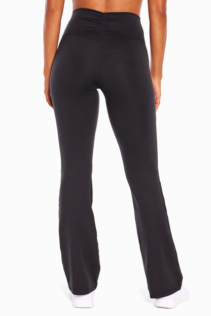 Balance Collection Karma Pant, back view in black. 