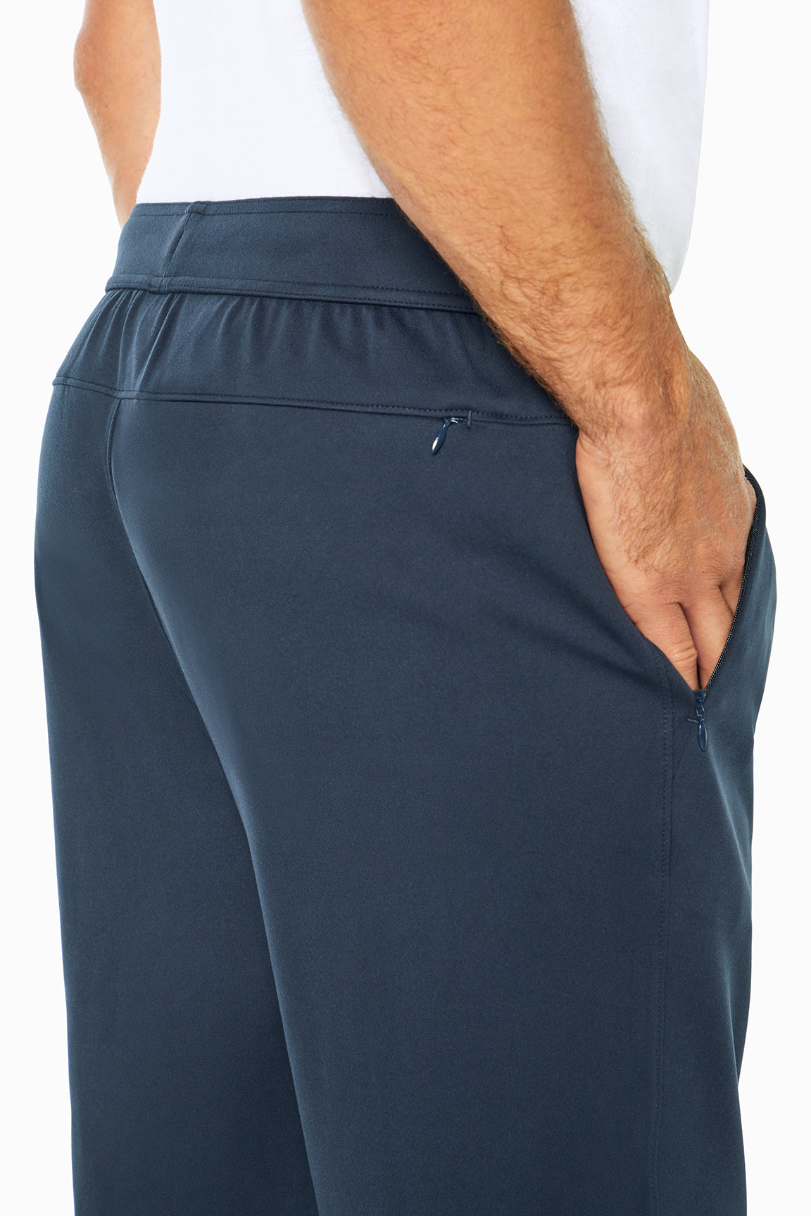 Balance Collection For Men Commuter Pant, side view showing pocket placement, showing visible design features and texture of the durable stretch.. 