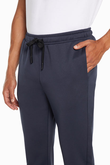 Balance Collection For Men Tevin Jogger, back view, showing visible design features and texture of the soft knit fabric.. 