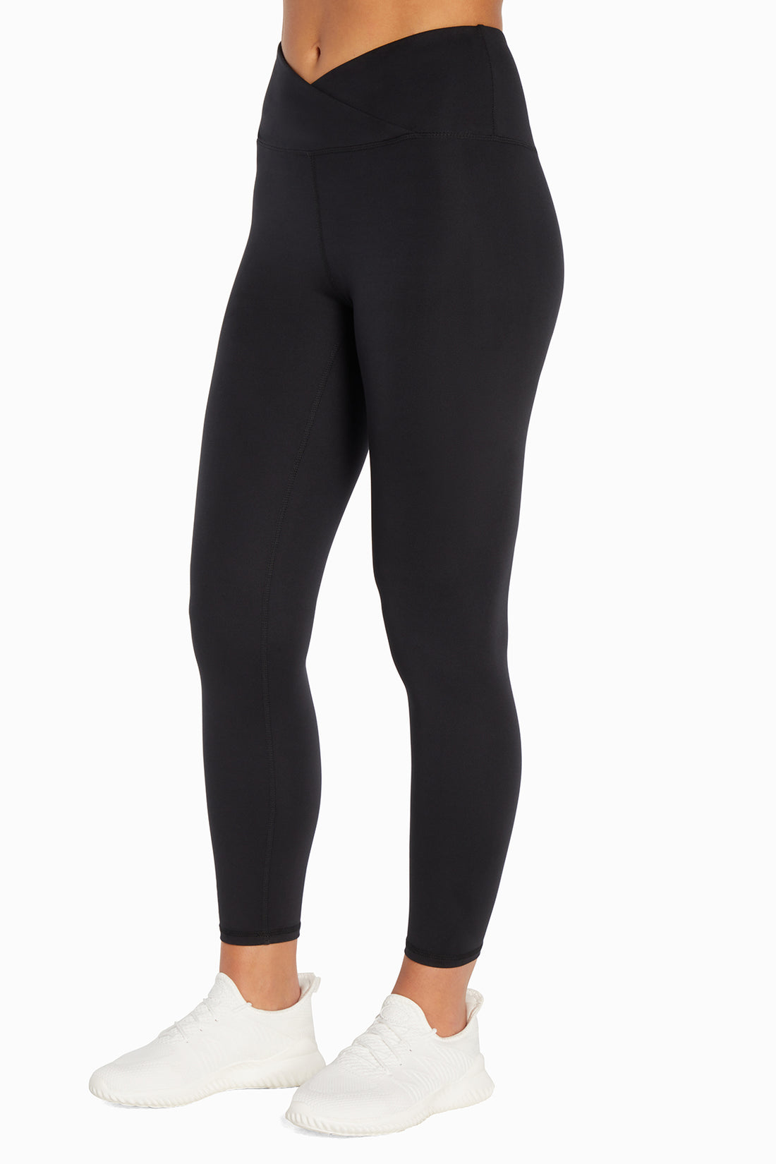 Balance Collection Crossover Legging, front view, showing visible design features and texture of the stretch knit fabric..