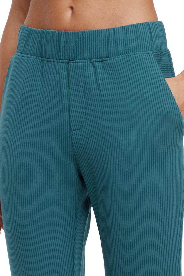 Paige Bootcut Pant, close-up view of fabric and stitching, showing visible design features and texture of the durable stretch fabric.. #color_green-heron