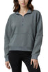 Camila 1/4 Zip Jacket, alternate angle view, showing visible design features and texture of the smooth woven fabric.. 