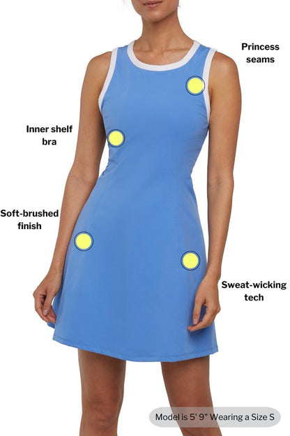 Talia Dress, close-up view of fabric and stitching, showing visible design features and texture of the soft knit fabric.. 