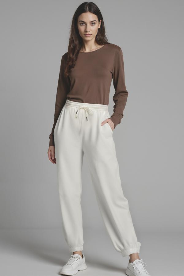 Camila Jogger, alternate angle view, showing visible design features and texture of the soft knit fabric.. #color_egret