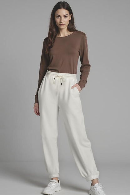 Camila Jogger, alternate angle view, showing visible design features and texture of the soft knit fabric.. 
